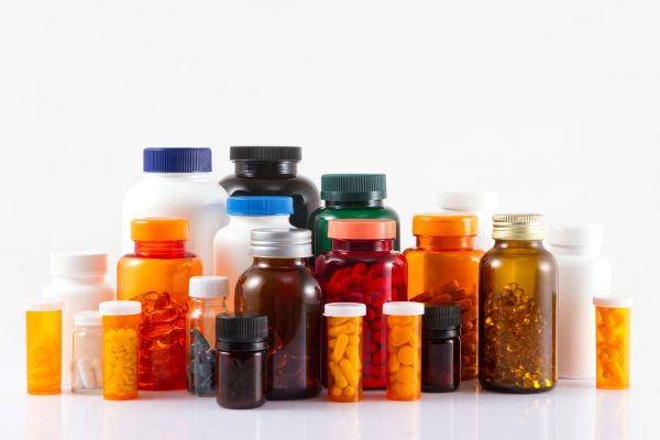 plastic and glass pill bottles